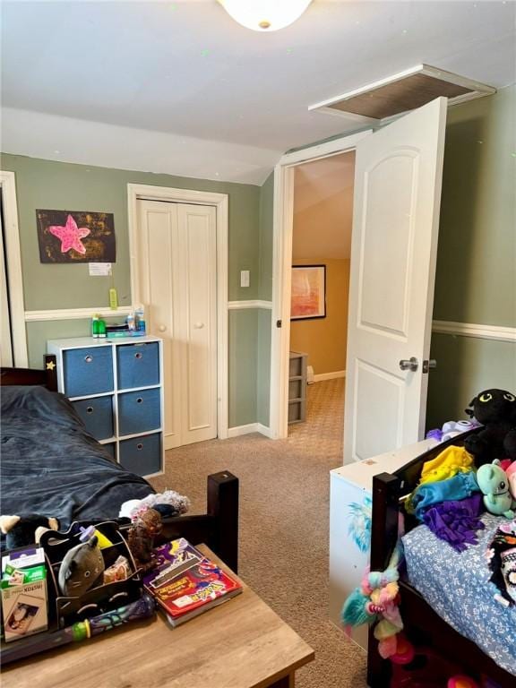 bedroom featuring carpet flooring and lofted ceiling