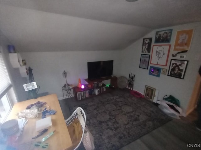 living room with lofted ceiling