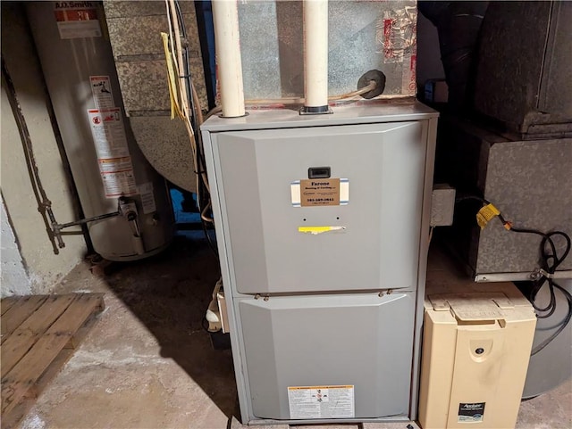 utilities featuring heating unit and gas water heater