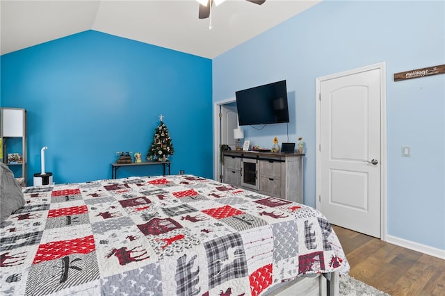 bedroom featuring lofted ceiling, hardwood / wood-style floors, and ceiling fan