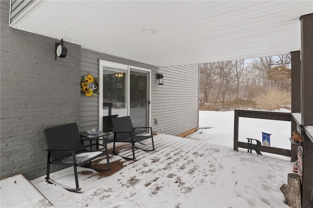 view of snow covered patio