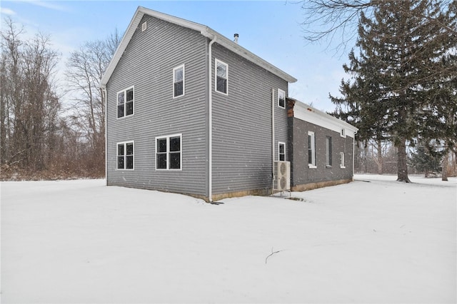 view of snow covered property