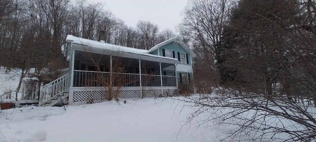 view of snow covered property