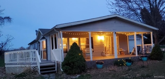 view of front of home with a deck