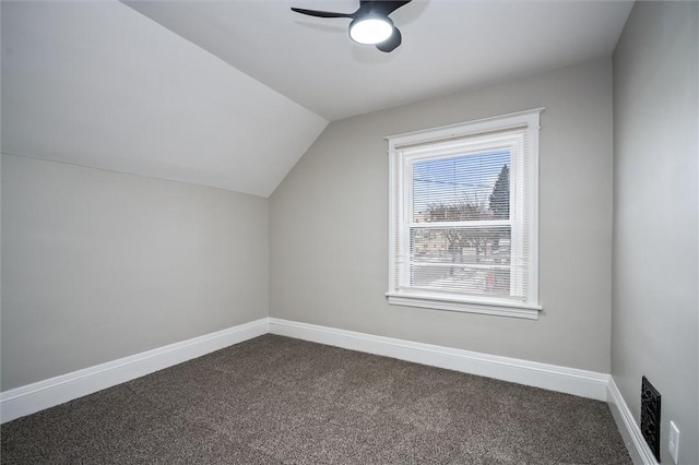 bonus room with ceiling fan, lofted ceiling, and carpet flooring