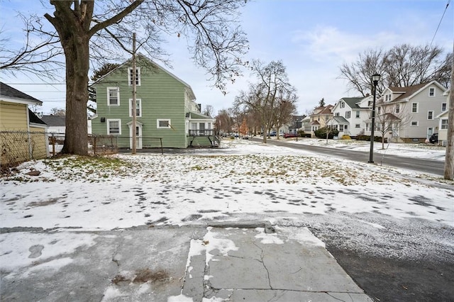 view of snow covered property