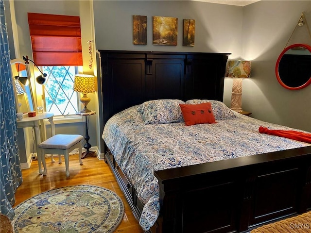 bedroom featuring light hardwood / wood-style floors