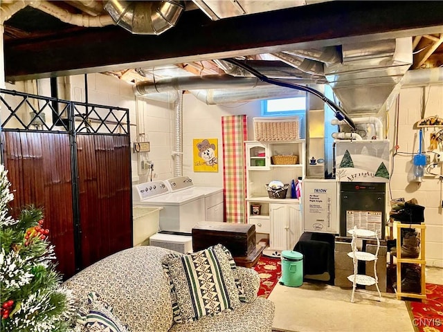 basement featuring washer and clothes dryer