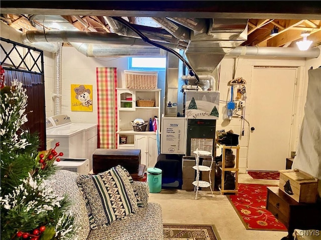 basement with washing machine and clothes dryer