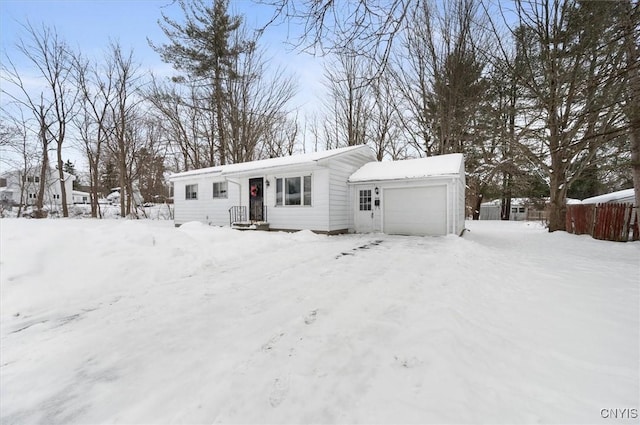 view of front of home with a garage