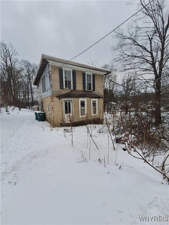 view of snow covered property