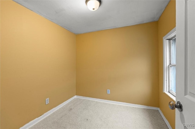 unfurnished room with carpet floors