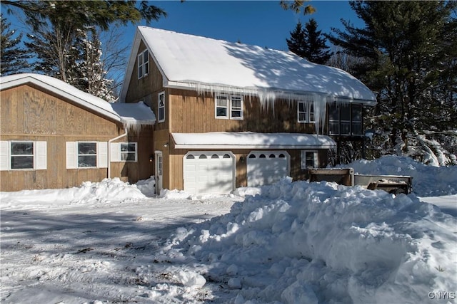 view of front of property with a garage