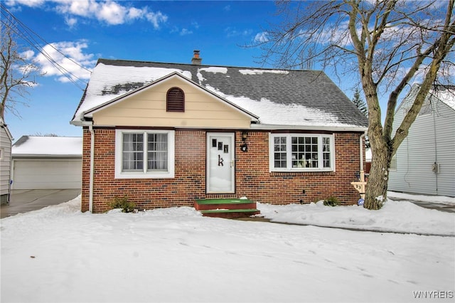 bungalow-style house with an outbuilding and a garage