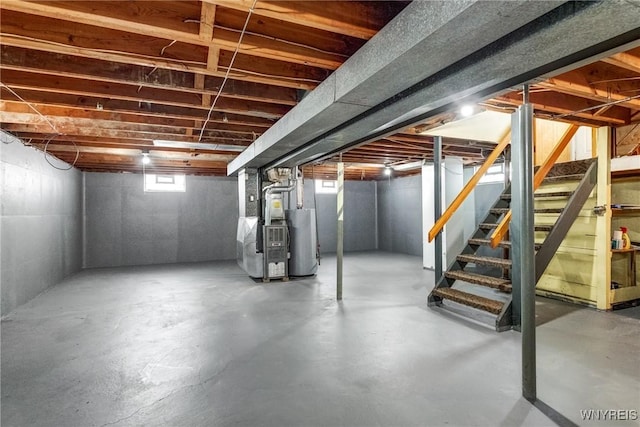 basement with heating unit and water heater