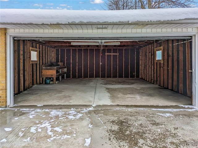 view of snow covered garage