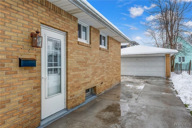 view of side of property with a garage and an outdoor structure