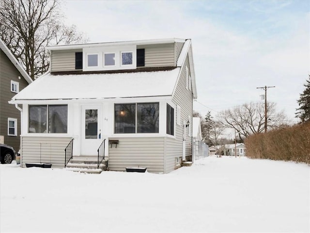 view of snow covered property