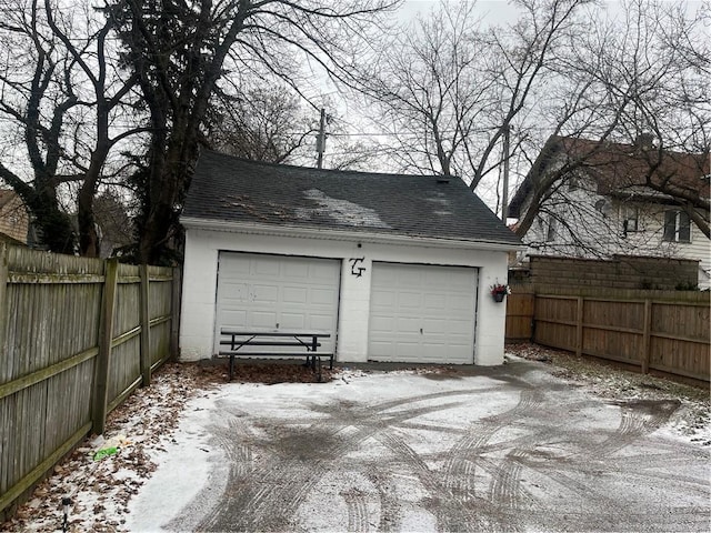 view of snow covered garage