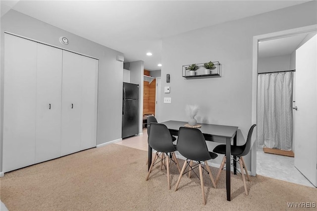 view of carpeted dining room