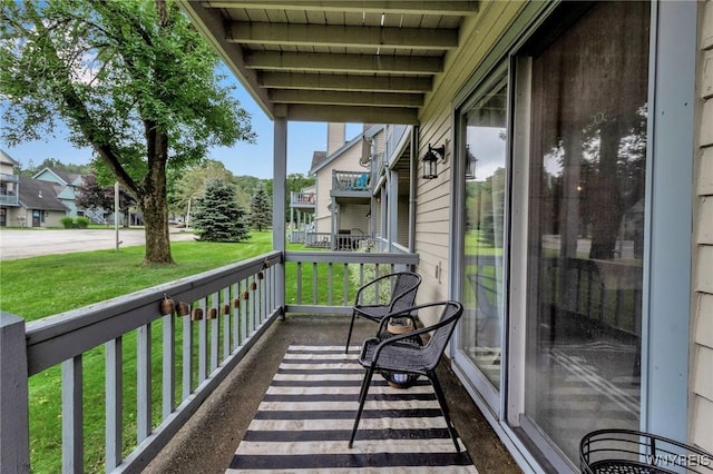 balcony featuring a porch