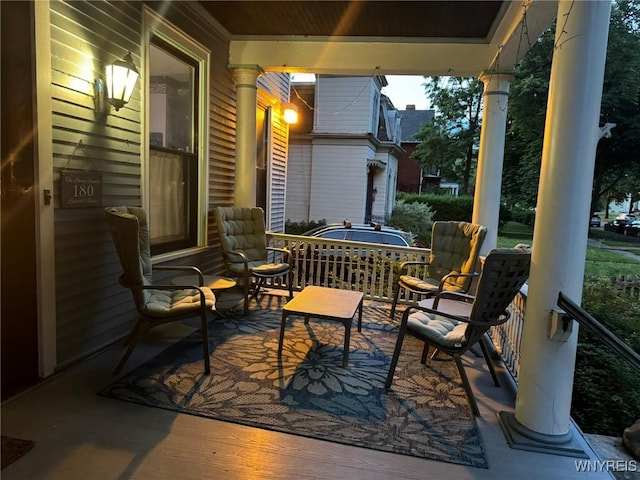 view of patio featuring covered porch