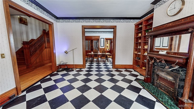 interior space with crown molding