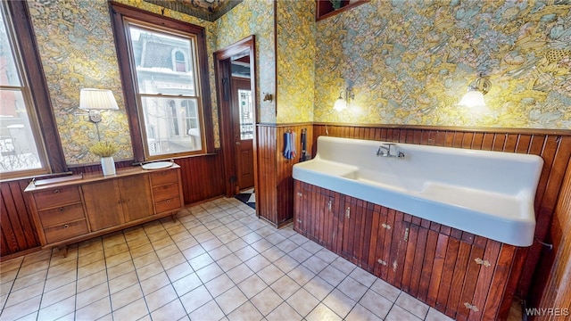 bathroom with tile patterned flooring