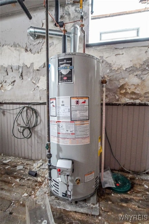 utility room with water heater