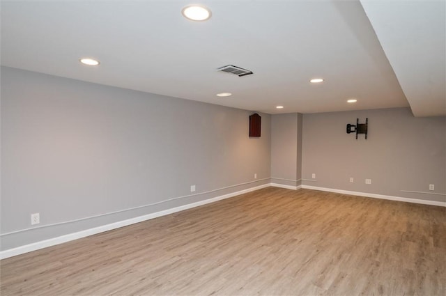 basement featuring light wood-type flooring