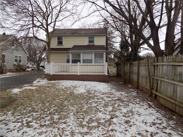 view of snow covered property