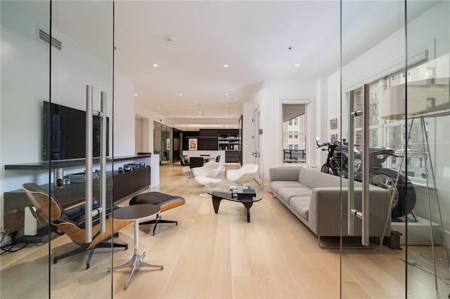 living room featuring light hardwood / wood-style flooring