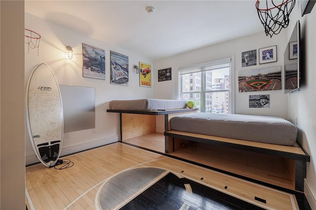 bedroom featuring hardwood / wood-style flooring