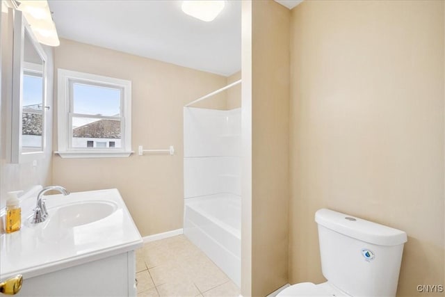 full bathroom featuring tub / shower combination, tile patterned floors, vanity, and toilet