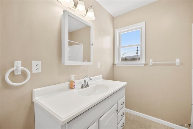 bathroom featuring vanity and tile patterned flooring