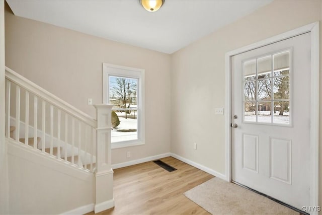 entrance foyer featuring light hardwood / wood-style floors