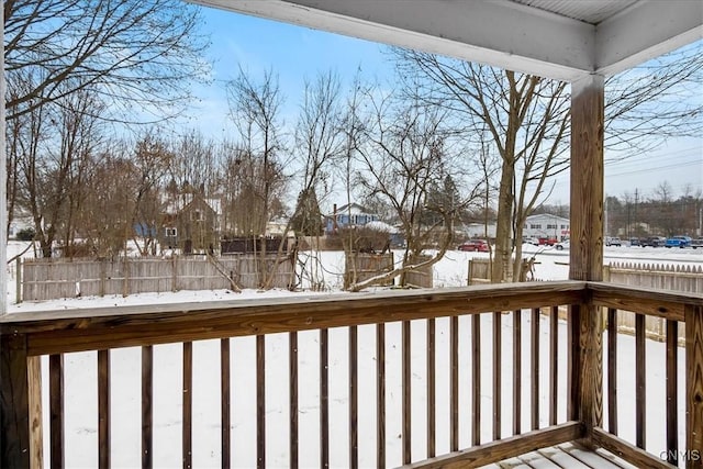 view of snow covered deck