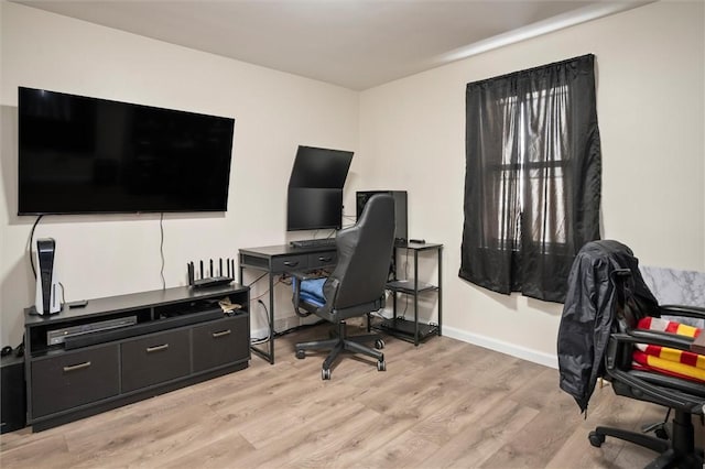 office space featuring light wood-type flooring