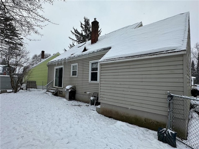 view of snow covered property