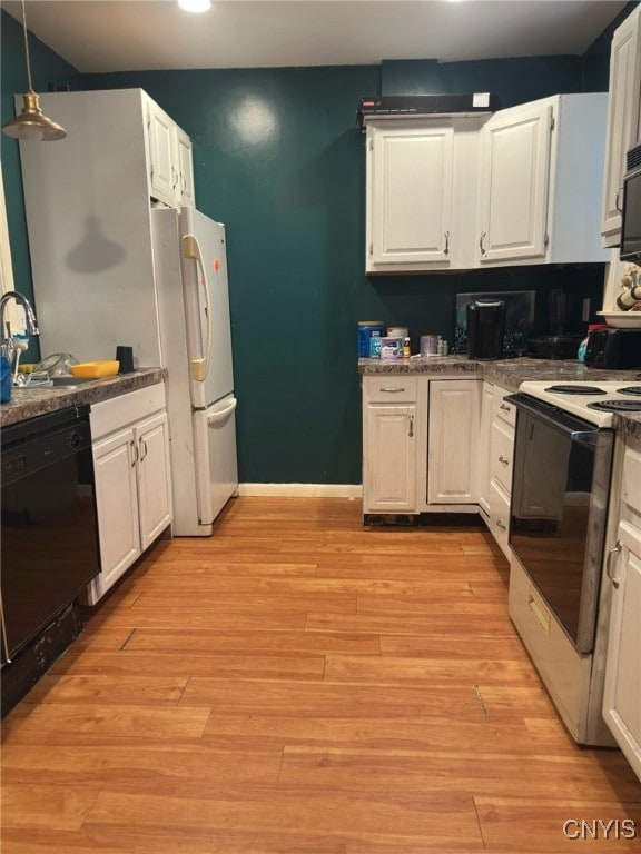 kitchen featuring white cabinetry, white appliances, and hanging light fixtures