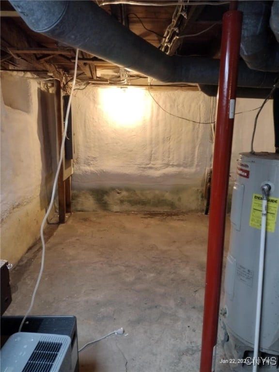 basement featuring electric water heater