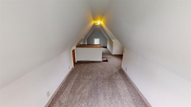 bonus room with carpet and lofted ceiling