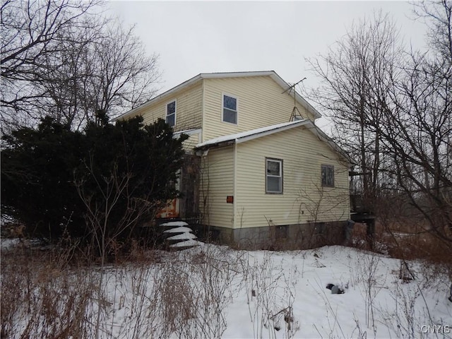 view of snow covered property