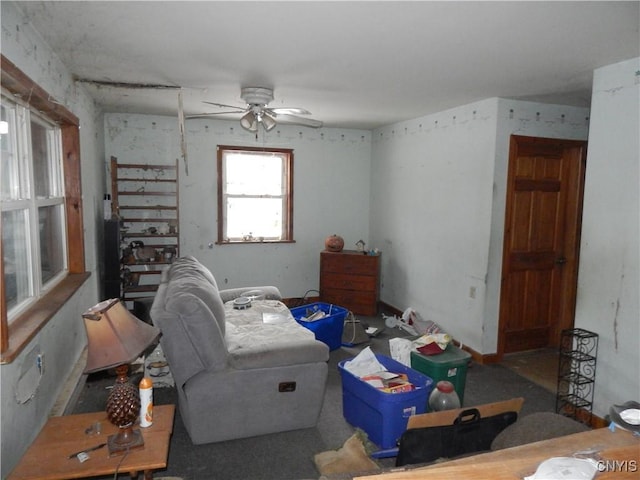 living room featuring ceiling fan