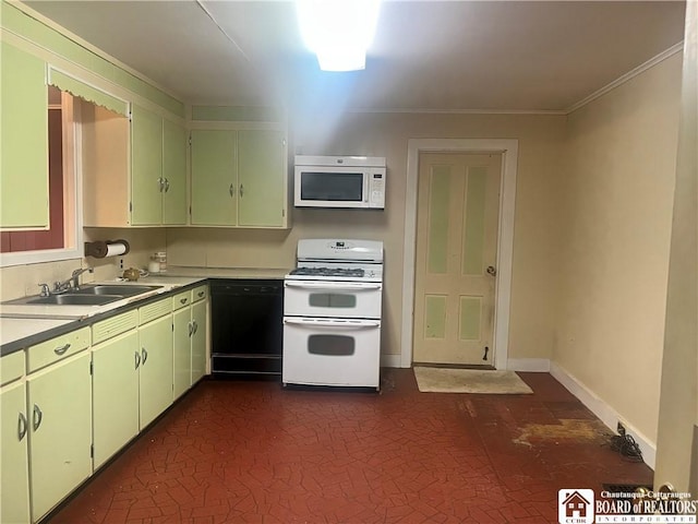 kitchen with sink, white appliances, and crown molding