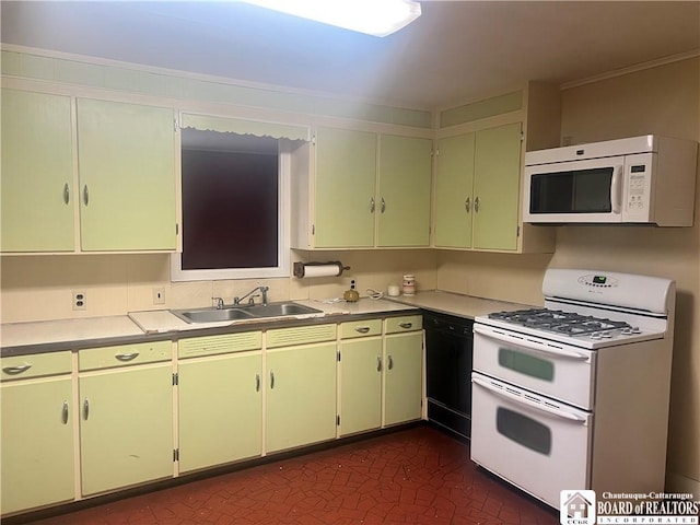 kitchen featuring sink and white appliances