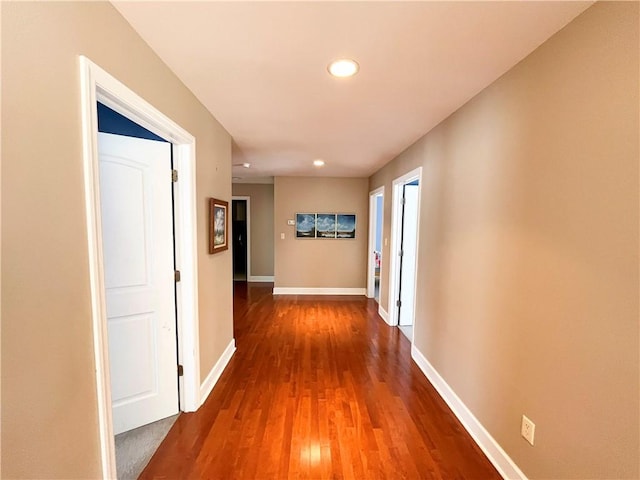 hallway featuring hardwood / wood-style flooring