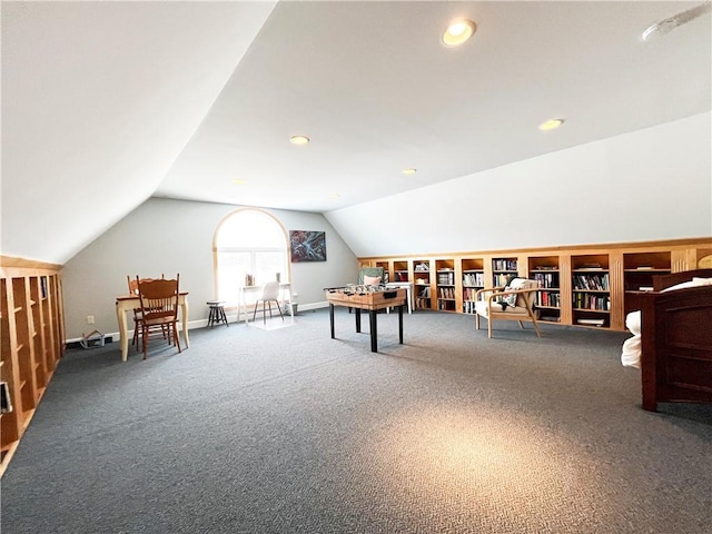 playroom featuring lofted ceiling and carpet floors