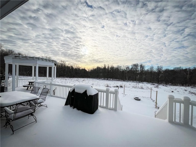 view of snow covered patio