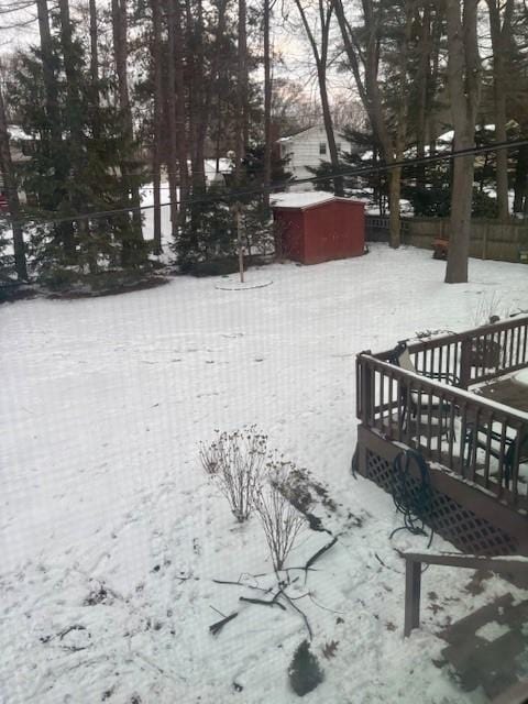 view of yard layered in snow